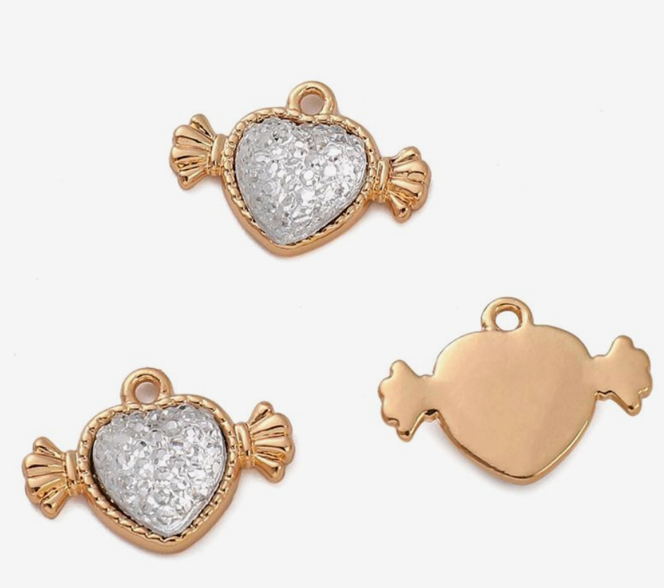 white and pink collection charms