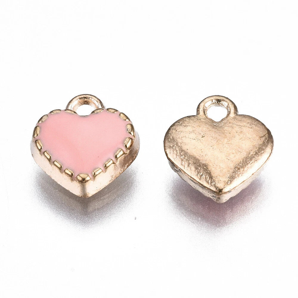 white and pink collection charms